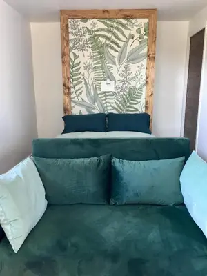Coin salon dans l'établissement COTTAGE A LA FONTAINE DU CHENE