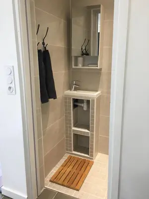 Salle de bains dans l'établissement COTTAGE A LA FONTAINE DU CHENE