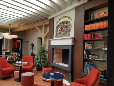 Coin salon dans l'établissement Relais des Trois Châteaux Hôtel-Restaurant - Teritoria