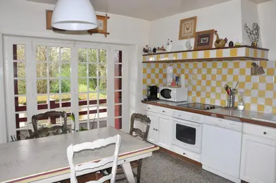 Cuisine ou kitchenette dans l'établissement Le Clos du Petit Dannezy