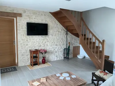 Télévision ou salle de divertissement dans l'établissement Le Gite du Chemin Vert