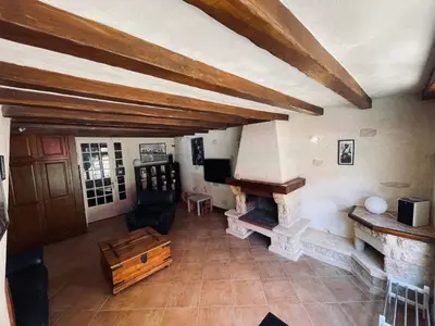 Coin salon dans l'établissement Gîte la Pahèserie