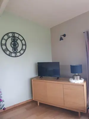 Télévision ou salle de divertissement dans l'établissement Gîte du 
