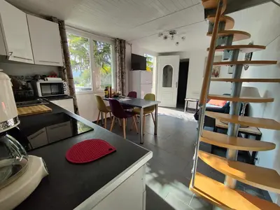 Cuisine ou kitchenette dans l'établissement Gîte Pause au jardin piscine chauffée
