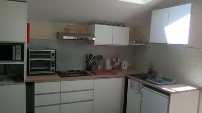Cuisine ou kitchenette dans l'établissement L'arbrissel