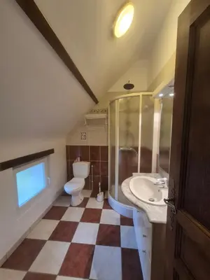 Salle de bains dans l'établissement Le Moulin Garnier