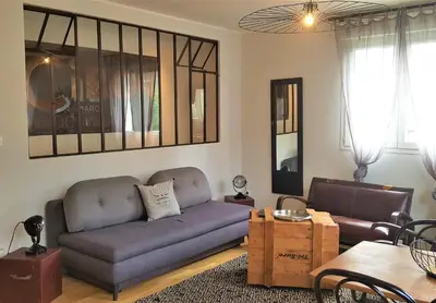 Coin salon dans l'établissement Guest house 