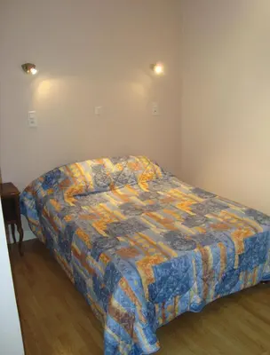 Un ou plusieurs lits dans un hébergement de l'établissement Splendid Hôtel