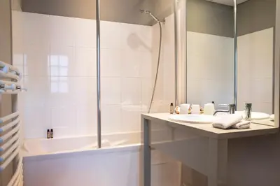 Salle de bains dans l'établissement Le Mans Country Club