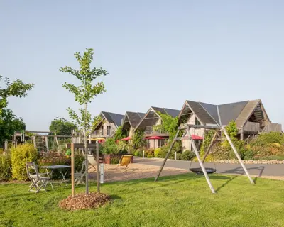 Aire de jeux pour enfants de l'établissement Le jardin des 4 saisons