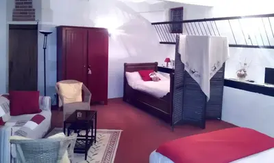 Un ou plusieurs lits dans un hébergement de l'établissement Studio confortable à Thilouze de 55 m² avec jardin privatif
