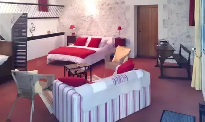 Coin salon dans l'établissement Studio confortable à Thilouze de 55 m² avec jardin privatif