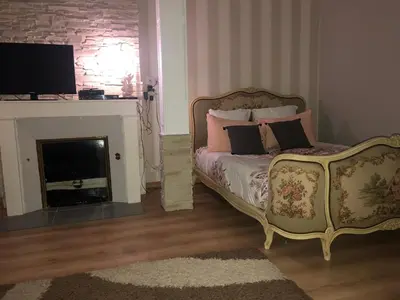 Un ou plusieurs lits dans un hébergement de l'établissement Appartement porte chartraine