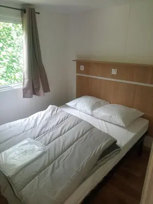 Un ou plusieurs lits dans un hébergement de l'établissement Camping de Marcilly sur Vienne