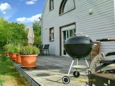 Barbecue disponible mis à disposition des clients de la villa