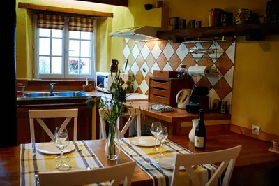 Coin salon dans l'établissement Gite Domaine de la Juranvillerie