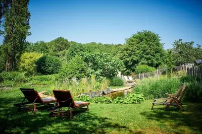 Jardin de l'établissement Gite Domaine de la Juranvillerie