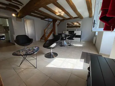 Coin salon dans l'établissement Le 38, gite 2 chambres proche commerces