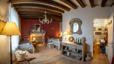 Coin salon dans l'établissement Entre Loire et Sologne Maison d'hôtes