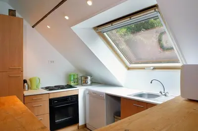 Cuisine ou kitchenette dans l'établissement Appartement du Commun au Château de Chanteloup