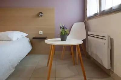 Un ou plusieurs lits dans un hébergement de l'établissement La petite maison 4
