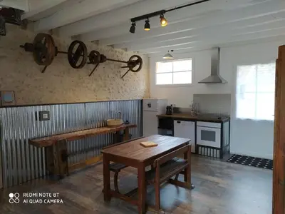 Cuisine ou kitchenette dans l'établissement Gîte L'atelier