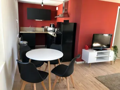 Cuisine ou kitchenette dans l'établissement Une parenthèse de confort à proximité du centre