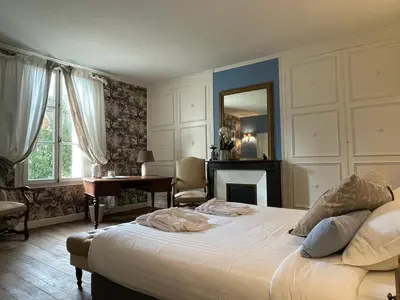 Un ou plusieurs lits dans un hébergement de l'établissement Maison Clairbois