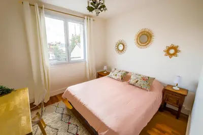 Un ou plusieurs lits dans un hébergement de l'établissement Appartement Rousseau - Centre Ville 5 minutes GARE
