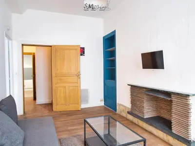Télévision ou salle de divertissement dans l'établissement Appartement hypercentre au 1er, ZOO - 24h du Mans