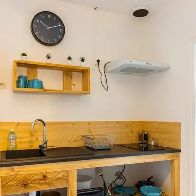 Cuisine ou kitchenette dans l'établissement Studio élément - Eau