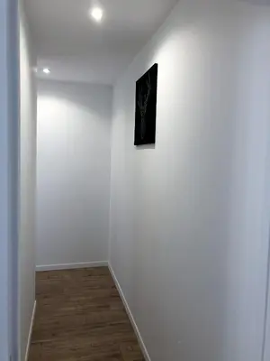 Télévision ou salle de divertissement dans l'établissement Grand appartement fonctionnel proche centre-ville