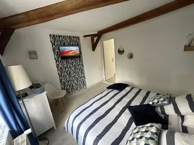 Un ou plusieurs lits dans un hébergement de l'établissement 2 chambres, 4 a 6 voyageurs en centre ville, à 5 mins du zoo