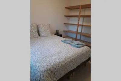Un ou plusieurs lits dans un hébergement de l'établissement Maison proche zoo