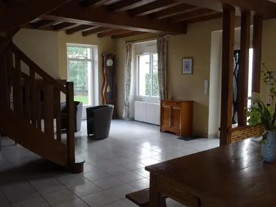 Coin salon dans l'établissement Gîte familial avec jardin et vélos, proche Le Mans - FR-1-410-146