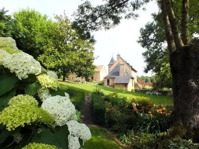 Jardin de l'établissement Charme et authenticité : gîte pour 4 pers. en bord de rivière avec jardin enchanteur en Sarthe - FR-1-410-236