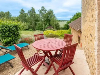 Jardin de l'établissement Charme et authenticité : gîte pour 4 pers. en bord de rivière avec jardin enchanteur en Sarthe - FR-1-410-236