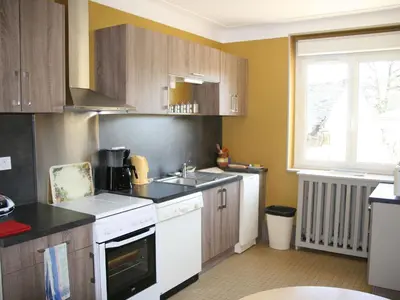 Cuisine ou kitchenette dans l'établissement Maison confortable avec jardin, proche centre-ville et circuit 24h du Mans - FR-1-410-271