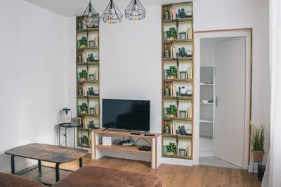 Télévision ou salle de divertissement dans l'établissement T2 BedinSaumur LOIRE CHATEAU tout CONFORT