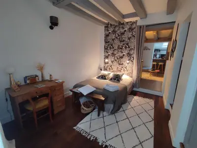Un ou plusieurs lits dans un hébergement de l'établissement APPARTEMENT QUARTIER CATHEDRALE