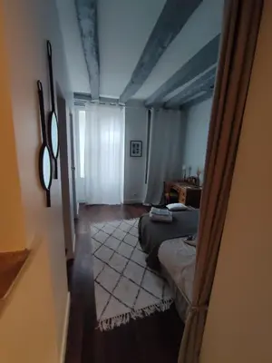 Un ou plusieurs lits dans un hébergement de l'établissement APPARTEMENT QUARTIER CATHEDRALE