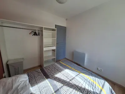 Un ou plusieurs lits dans un hébergement de l'établissement Bel appartement 50m2 en plein centre de Saumur