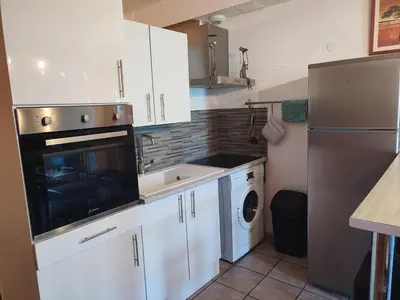 Cuisine ou kitchenette dans l'établissement appart centre ville bords de loire