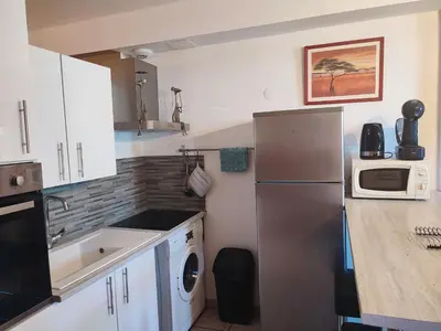 Cuisine ou kitchenette dans l'établissement appart centre ville bords de loire