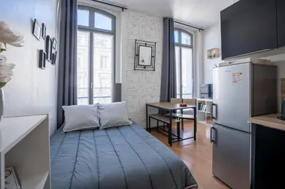 Cuisine ou kitchenette dans l'établissement Le CITY BREAK - halte idéale en hypercentre