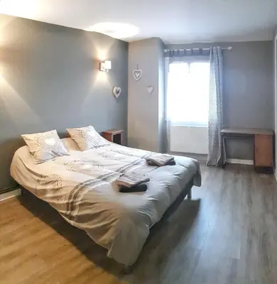 Un ou plusieurs lits dans un hébergement de l'établissement Maison de charme avec jardin aux Trois-Moutiers, 116 m², 6 pers.