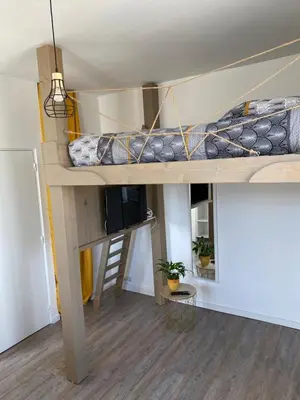 Un ou plusieurs lits dans un hébergement de l'établissement Studio cocoon