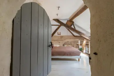Un ou plusieurs lits dans un hébergement de l'établissement La Maison des Chalands
