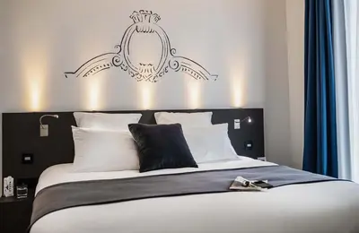 Un ou plusieurs lits dans un hébergement de l'établissement Best Western Premier Hotel de la Cite Royale