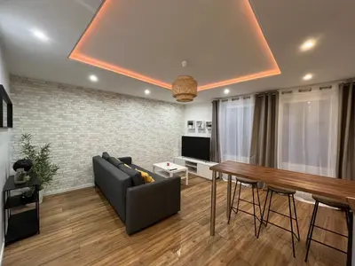 Télévision ou salle de divertissement dans l'établissement Moderne appartement - Gare - centre-ville